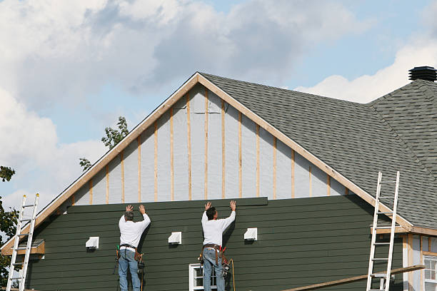 Professional Siding Contractor technician working in Durham, NC